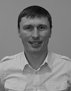 Олег
 Кожаев
